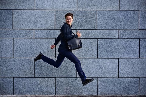 Nice day! Businessman makes a good deal, good mood