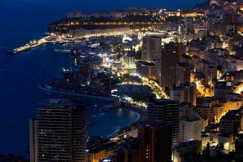 Monte Carlo panorama illuminated by night. Urban landscape with luxury architecture