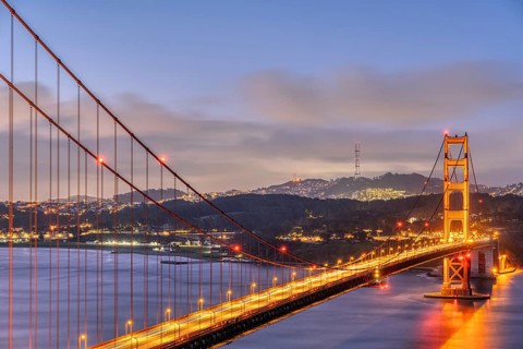 The famous Golden Gate Bridge in San Francisco in front of sunrise