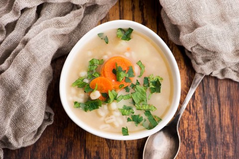 Barley soup, pearl barley in white bowl