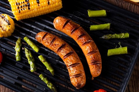 Grilled krakauer with french fries and green salad