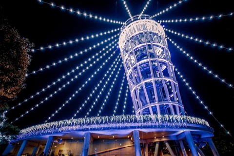 Lighthouse of the night view of Enoshima (sea candles). Shooting Location: Kamakura, Kanagawa