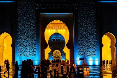 Shaking Id Mosque and People Silhouette (Abu Dhabi UAE). Shooting Location: Abdabi