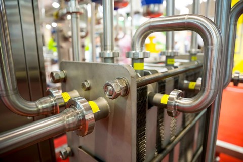 Milk pasteurization system is shown at a food and drink exhibition. Heat Treatments. Pasteurization