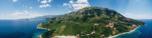 Panorama of the green hill and the beach Drobni Pijesak.