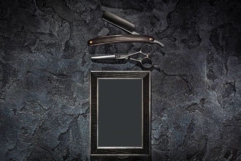 Black Stright Razor Scissors And Empty Frame In Barbershop Concept On Stone Slate Background