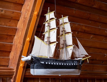 Votive ship named Glaube in the Schifferkirche church in Ahrenshoop on the Fischland-Darß-Zingst