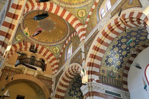 Domes with mosaics, neo-Romanesque-Byzantine Marian pilgrimage church Basilica Notre Dame de la
