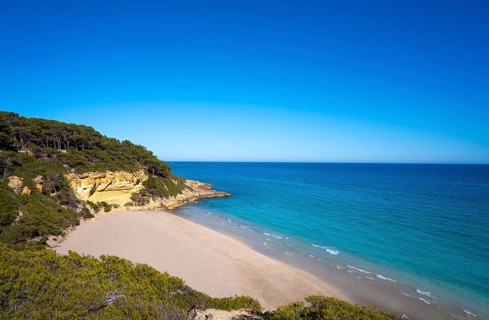 Cala Waikiki beach also Cala Fonda in Tarragona in Marquesa woods of Catalonia Spain
