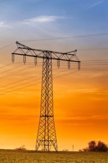 High-voltage power line High-voltage pylon in the sunset
