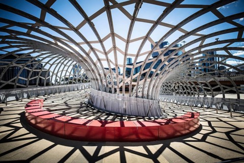 The iconic architecture of Webb Bridge on a warm spring morning in the Docklands area of Melbourne,