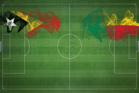 East Timor vs Benin Soccer Match, national colors, national flags, soccer field, football game,