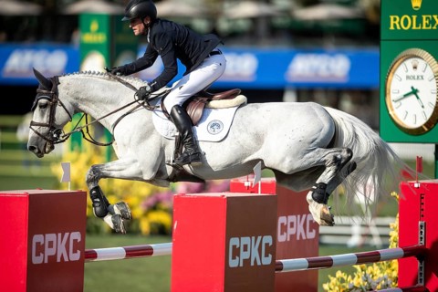 Irish rider Darragh Kenny riding VDL Cartello competes in the second round and jumpoff of the CPKC