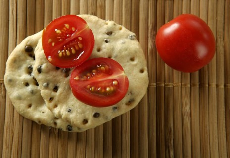 Sesame seeds biscuits over bamboo stripes
