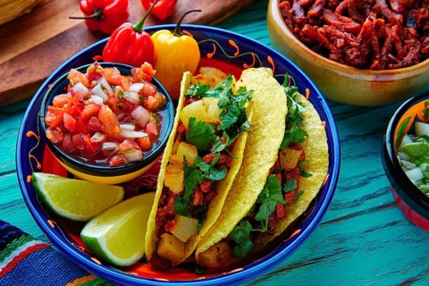 Tacos al pastor Mexican with coriander pineapple and chili