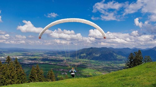 Paraglider takes off from the Blomberg launch site