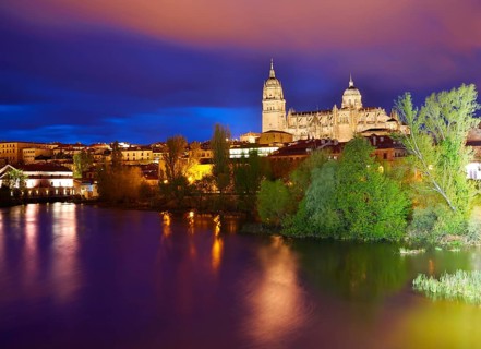 Salamanca skyline sunset with Tormes river in Spain