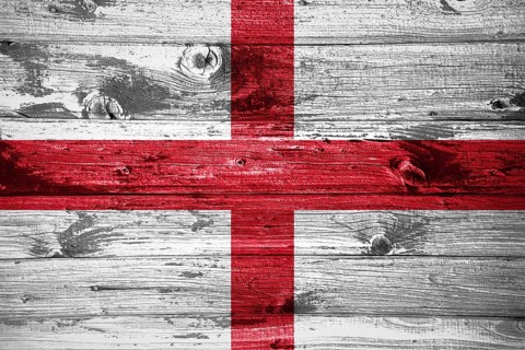 England flag on wooden planks background wood flag