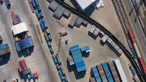 Aerial top view of cargo container terminal with railway, business transportation logistic in trade