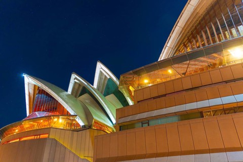 Opera house shining night view. Shooting Location: Australia, Sydney