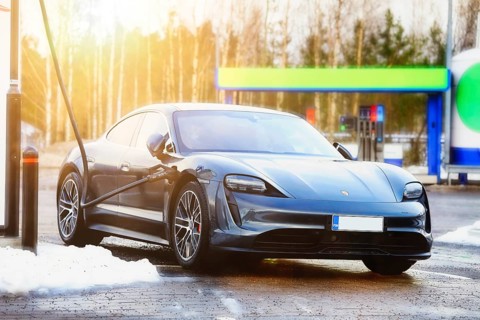 Porsche Taycan 4S electric car charging at Ionity. Paimio, Finland Jan 23, 21. Debuted in 2020,