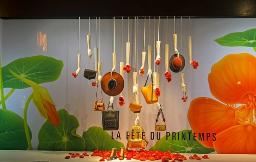 PARIS, FRANCE, MARCH 27, 2017: Fashion accessories in the showcase of the Printemps department
