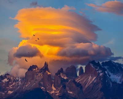 Sunset in the national park Torres del Paine, Chile. Sharp curved peaks Los Quernos. Under the