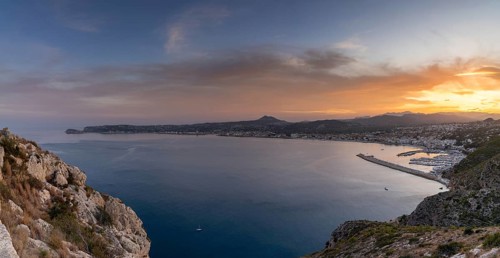 Panorama landscape view of Javea Bay and port in Alicante Province at sunset