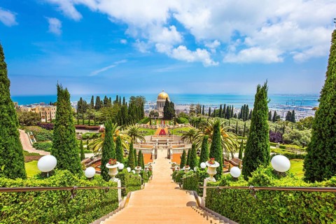 Bahai World Center. The descent to the Mediterranean Sea. Magnificent colonnade with a gilded dome