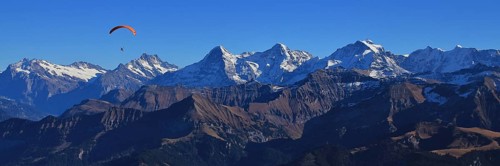Famous mountains Eiger, Monch and Jungfrau seen from Mount Niesen