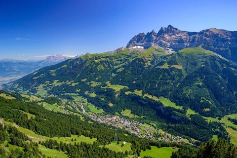 View of Champéry in summer, a town in Alps in Switzerland