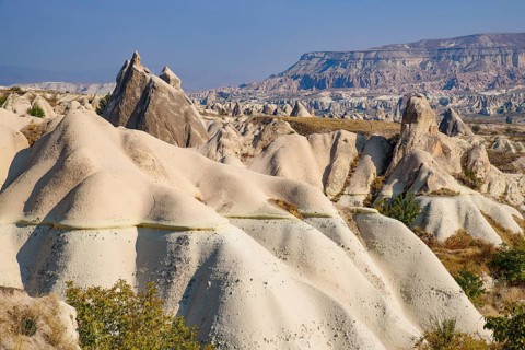 Rock formations of mountain ridges, valleys and pinnacles at Göreme National Park, Cappadocia,