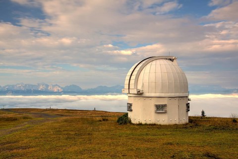 Observatory dome in the Gerlitzen Apls in Austria.View of the mountains in Slovenia