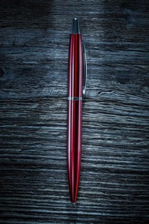 Pen on vintage wooden board