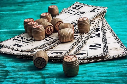 Traditional legacy of the ancient Board game Lotto on wooden background