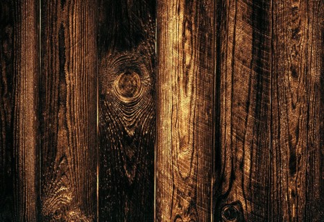 Wooden dark texture of boards close-up