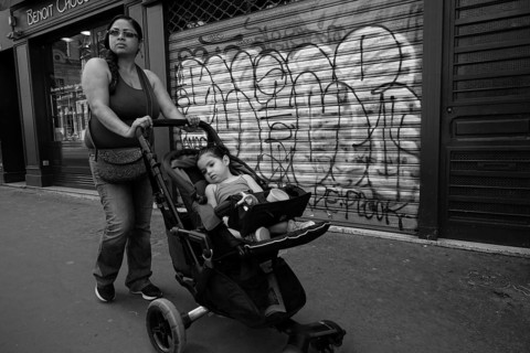 Woman pushing pram, paris streets, france, europe?