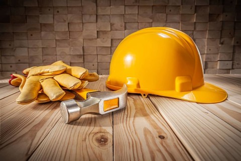 Construction Safety Tools And Workwear. Yellow Helmet Claw Hammer Leather Gloves. Wooden Beams