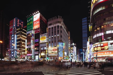 Shinjuku, Japan, May 18 2019: Neon signs illuminate Tokyo's busy Shinjuku neighborhood at night