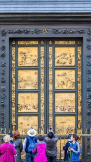 People at the Gates of Paradise at the Baptistery of St. John in Florence, Italy, Europe
