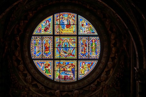 SIENA, ITALY, SEPTEMBER 23, 2023, Rich ornate window with mother mary above the presbytery of the