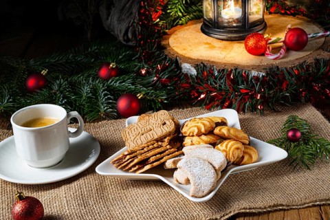 Different types of biscuits with rustic Christmas decorations