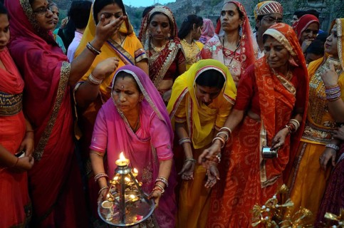 Women performing aarti of raj Gangaur Mehrangarh Fort Jodhpur rajasthan, India, Asia