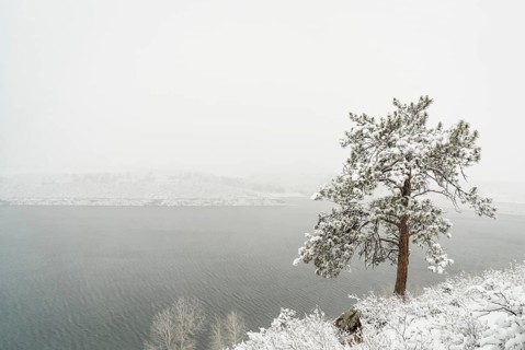 Mountain lake in a heavy April snowstorm - Horsetooth Reservoir in Fort Collins, Colorado