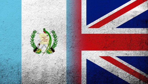 National flag of United Kingdom (Great Britain) Union Jack with Guatemala National flag. Grunge