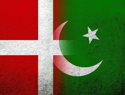 The Kingdom of Denmark National flag with Islamic Republic of Pakistan National flag. Grunge