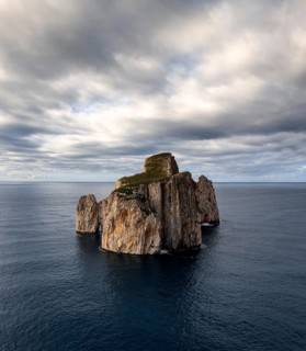 A view of the Pan di Zucchero sea stack in Porto Flavia on Sardinia