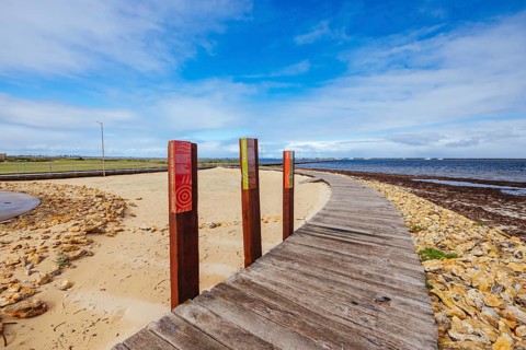 PORT MACDONNELL, AUSTRALIA, April 9 2023: Beach front views around Sea Parade and Port Mac Jetty in