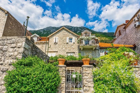 Residence in Perast surrounded by bushes and flowers, Montenegro, Europe