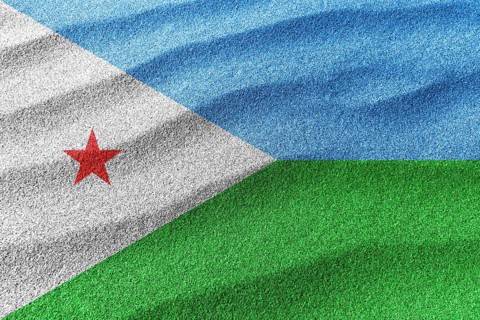 Djibouti sand flag, national flag sand background